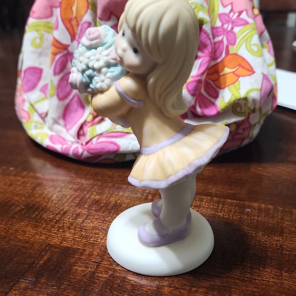 Charming Blonde Girl Figurine with Flowers